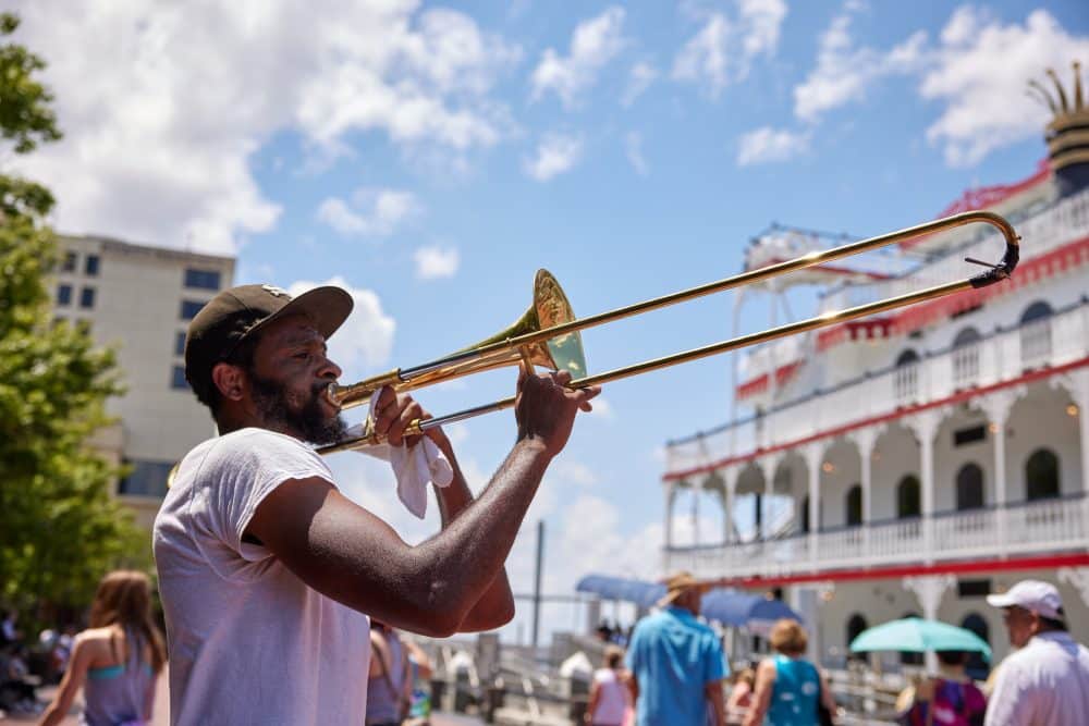 Playing instrument in heart of Savannah