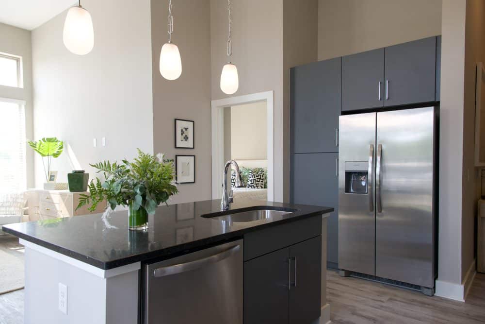 Interior kitchen with stainless steel appliances and kitchen island