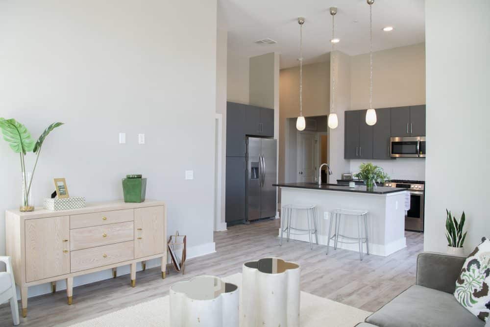 Interior kitchen with ample natural lighting and island