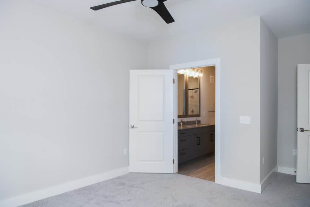 Spacious bedroom with ceiling fan