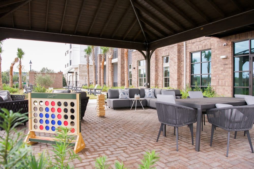 Outdoor courtyard area with games and seating